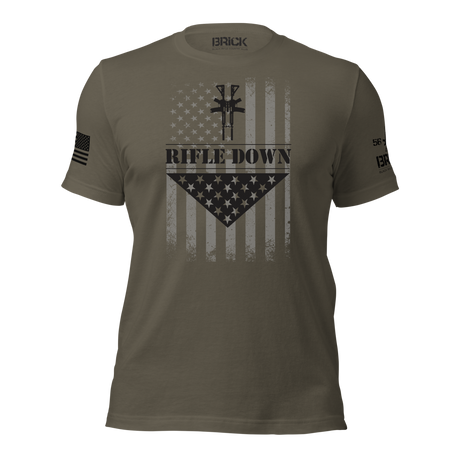 Olive green t-shirt with graphic design and 'BRICK' branding on a white background